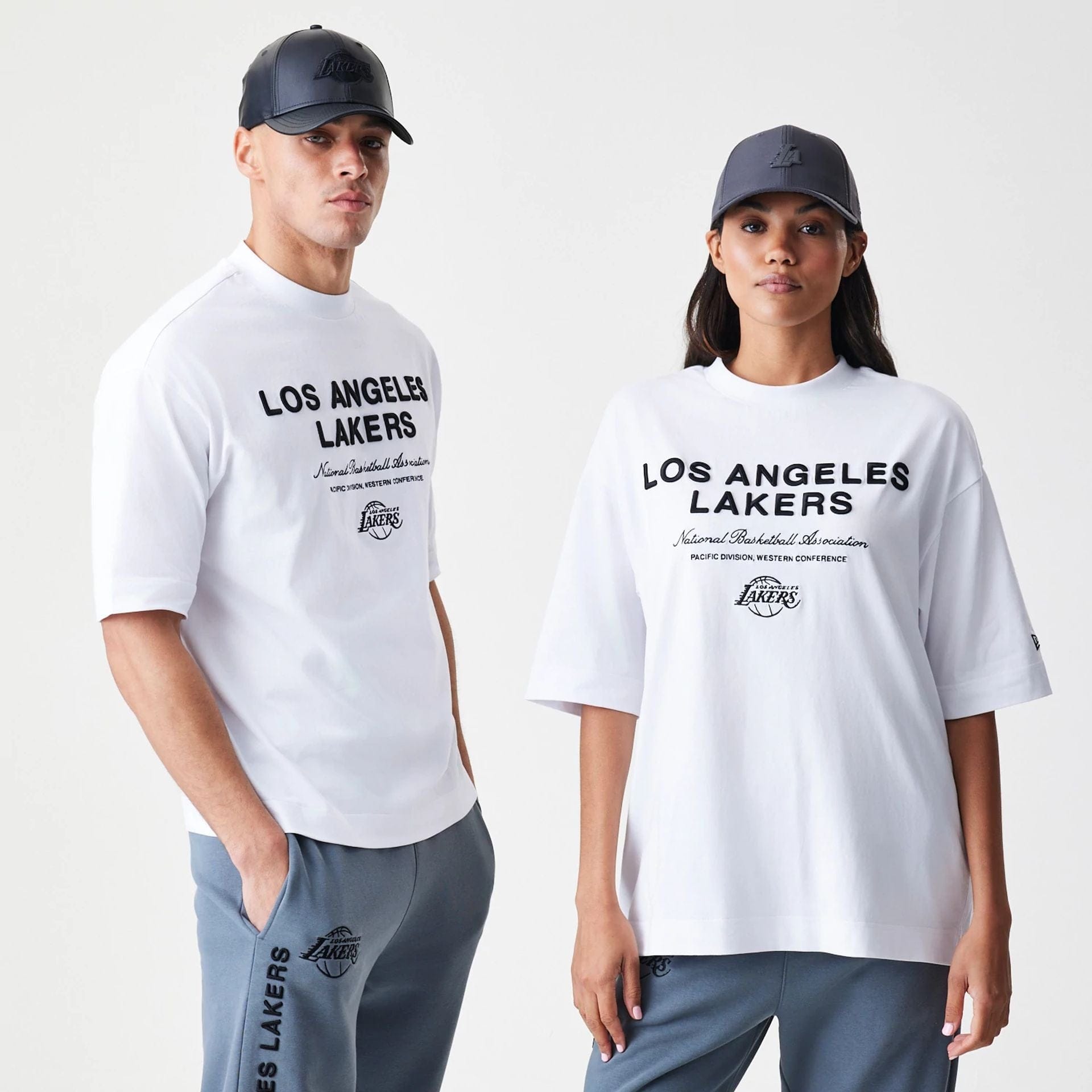 The Male model is wearing LA Lakers NBA Linear White T-Shirt  1