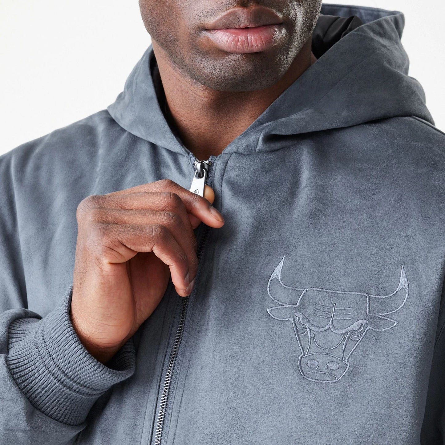 The Male model is wearing Chicago Bulls NBA Suede Dark Grey Jacket 6