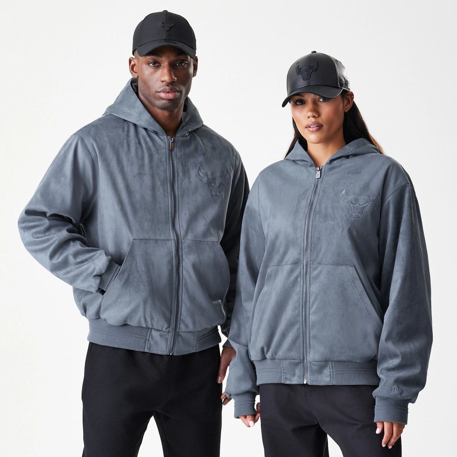 The Male model is wearing Chicago Bulls NBA Suede Dark Grey Jacket 1