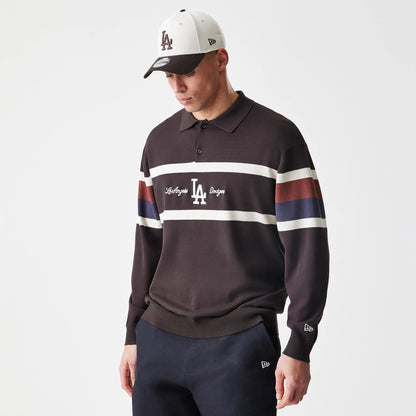 New Era LA Dodgers MLB Knit Brown Rugby Shirt, front view on a model with a white and black cap, showing an embroidered LA logo centred between horizontal stripes across the chest and New Era flag logo on the left sleeve.