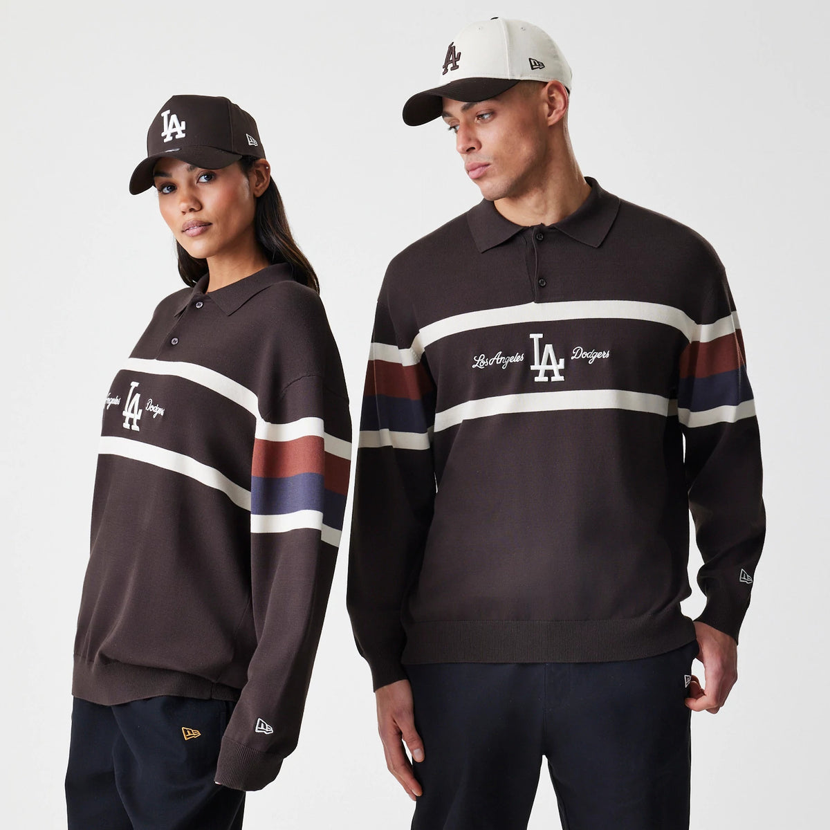 New Era LA Dodgers MLB Knit Brown Rugby Shirt, front view on models with matching caps, featuring an embroidered white LA logo on the chest across cream stripes and navy and burgundy sleeve bands.