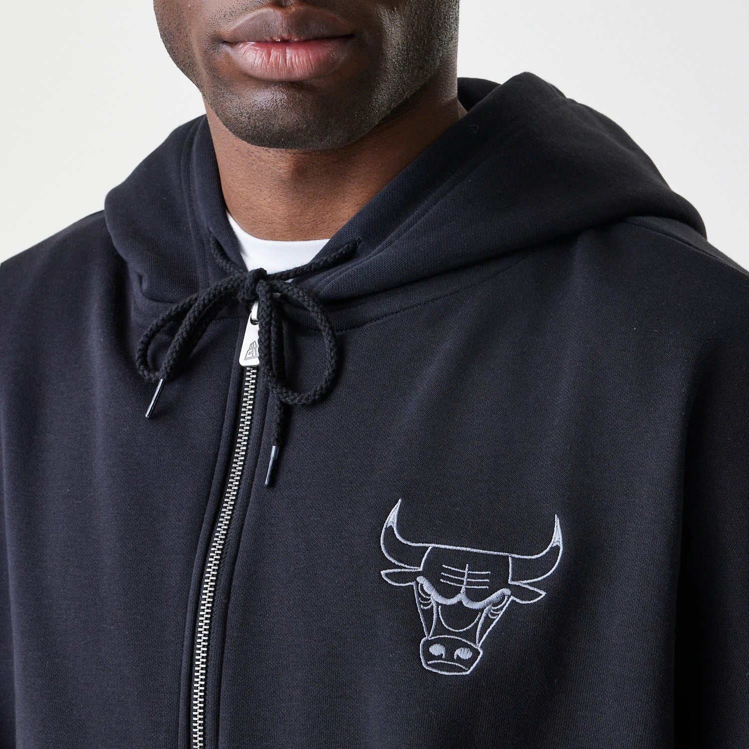 The Male model is wearing Chicago Bulls NBA Linear Black Oversized Full Zip Hoodie 4