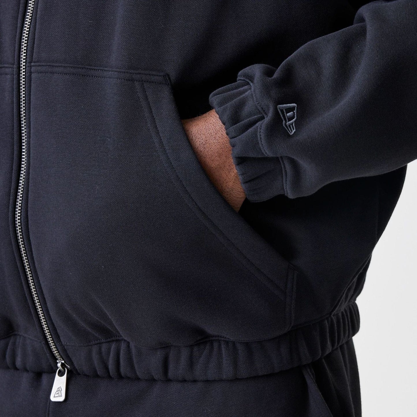 The Male model is wearing Chicago Bulls NBA Linear Black Oversized Full Zip Hoodie  5