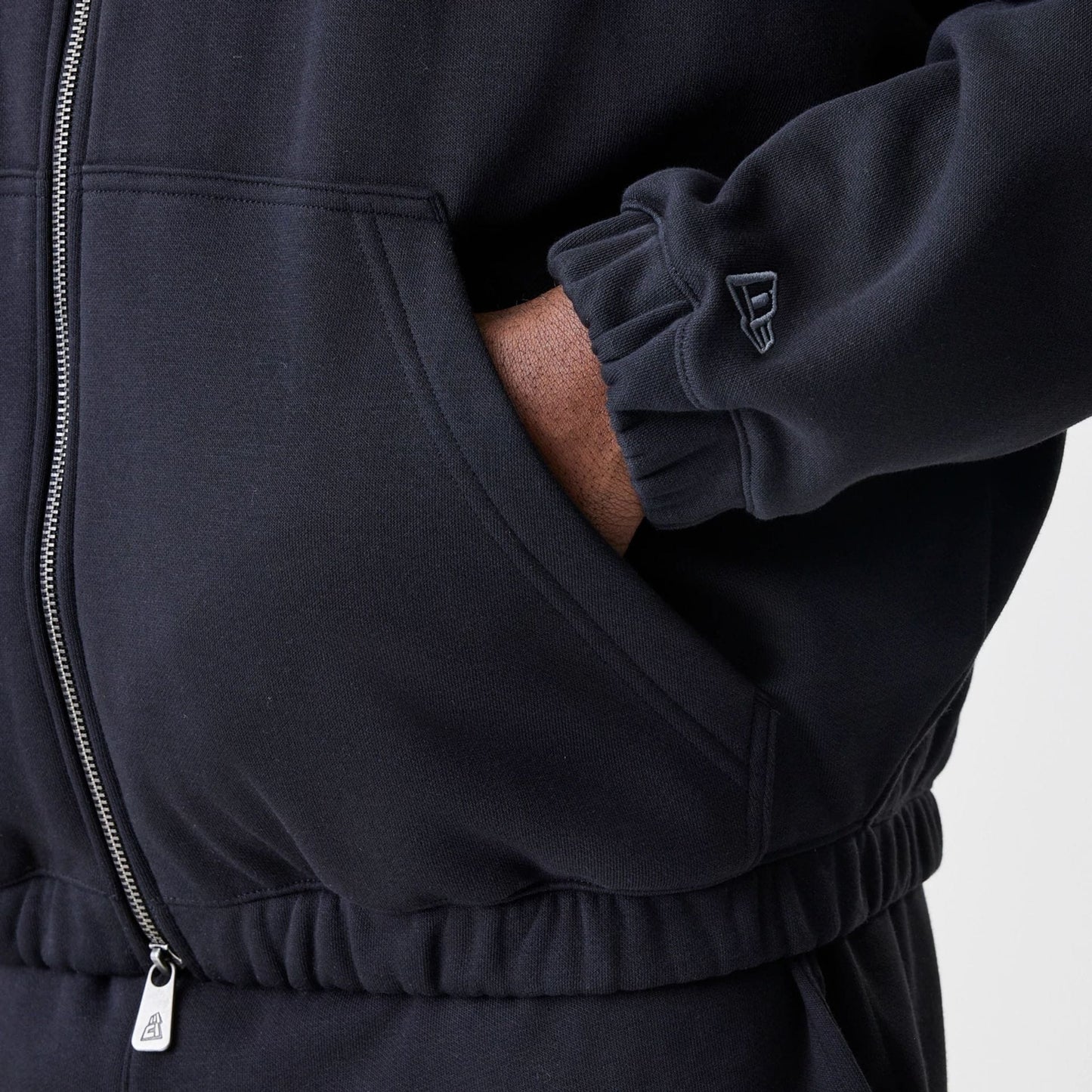 The Male model is wearing Chicago Bulls NBA Linear Black Oversized Full Zip Hoodie 5