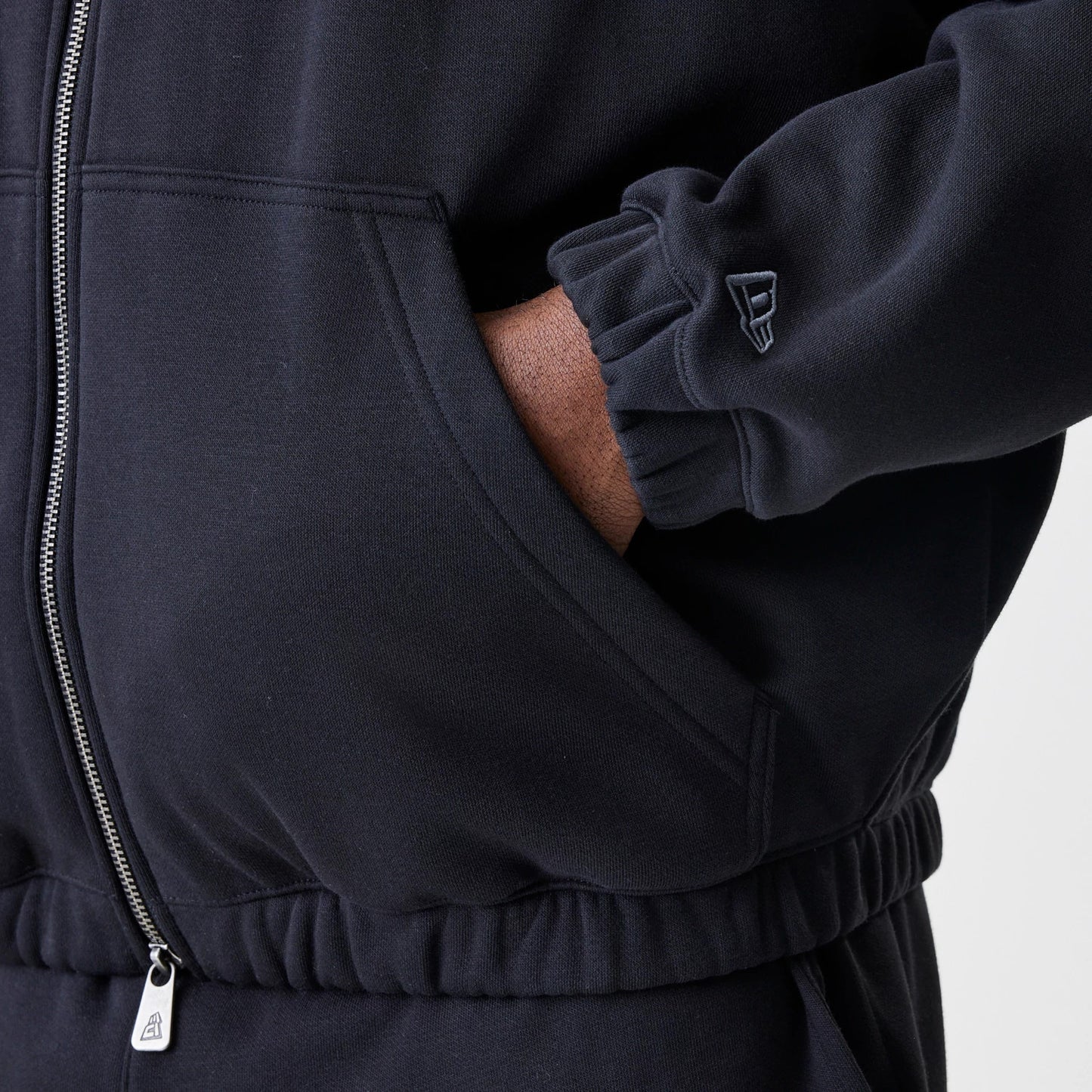 The Male model is wearing Chicago Bulls NBA Linear Black Oversized Full Zip Hoodie 5