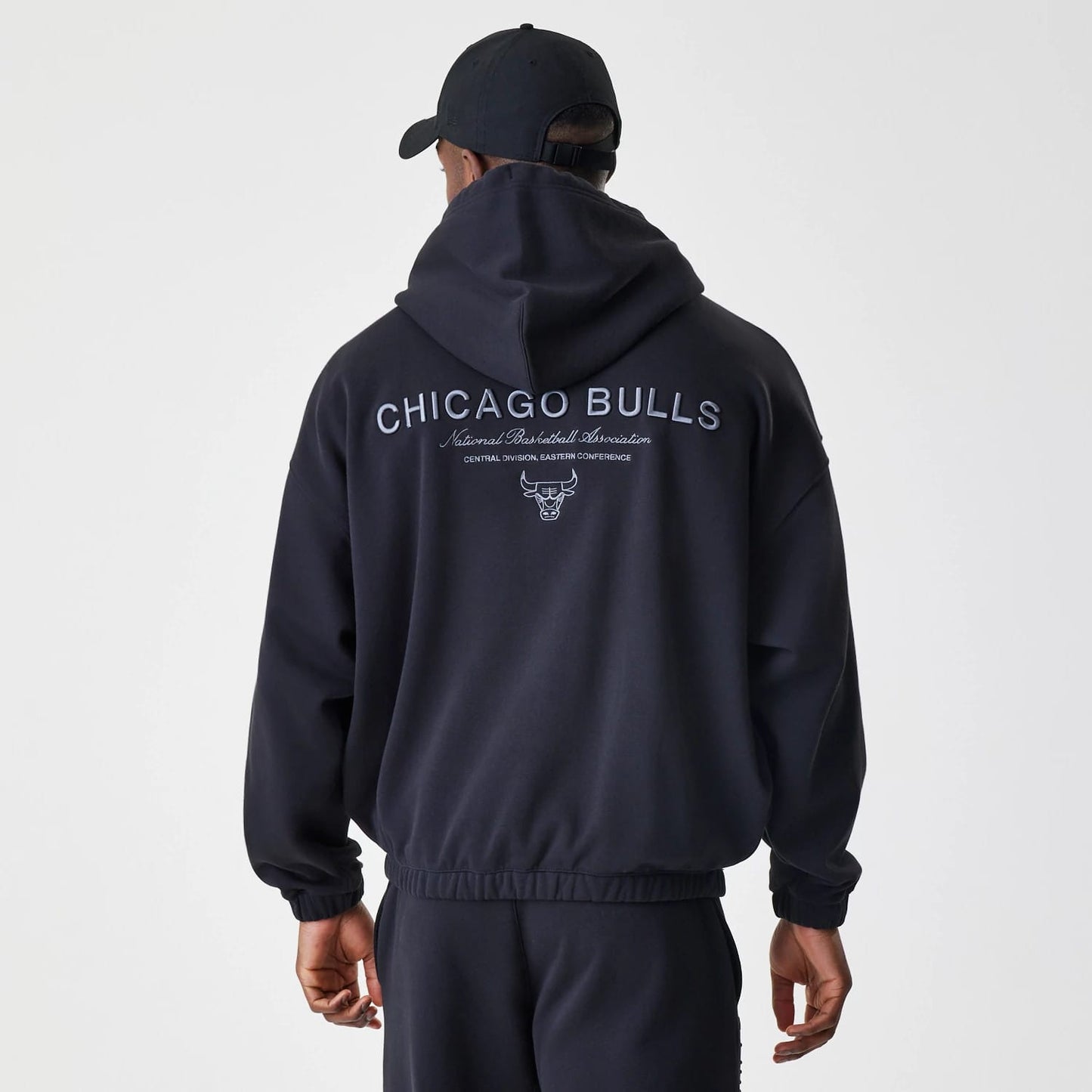 The Male model is wearing Chicago Bulls NBA Linear Black Oversized Full Zip Hoodie 2