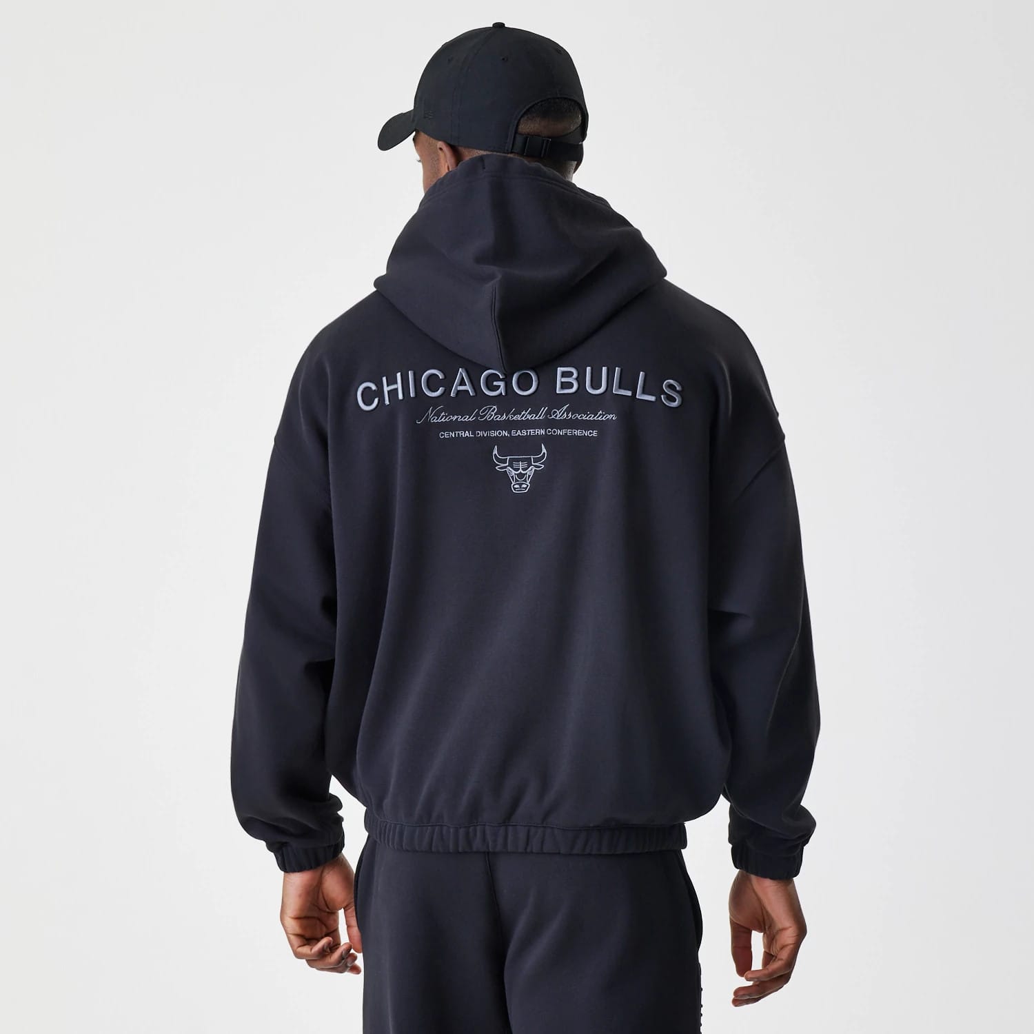 The Male model is wearing Chicago Bulls NBA Linear Black Oversized Full Zip Hoodie 2