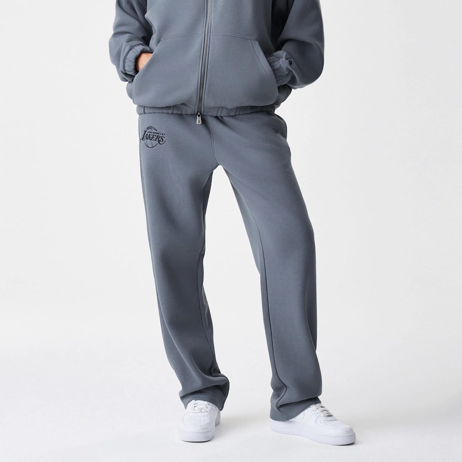 The Male model is wearing LA Lakers NBA Linear Dark Grey Straight Leg Joggers 6