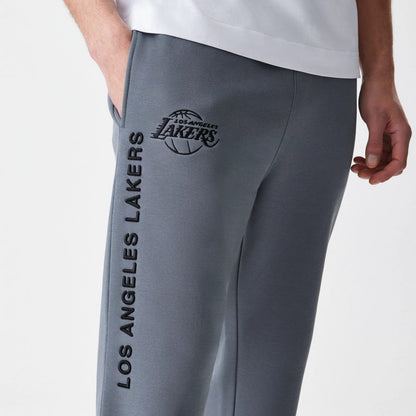 The Male model is wearing LA Lakers NBA Linear Dark Grey Straight Leg Joggers 7
