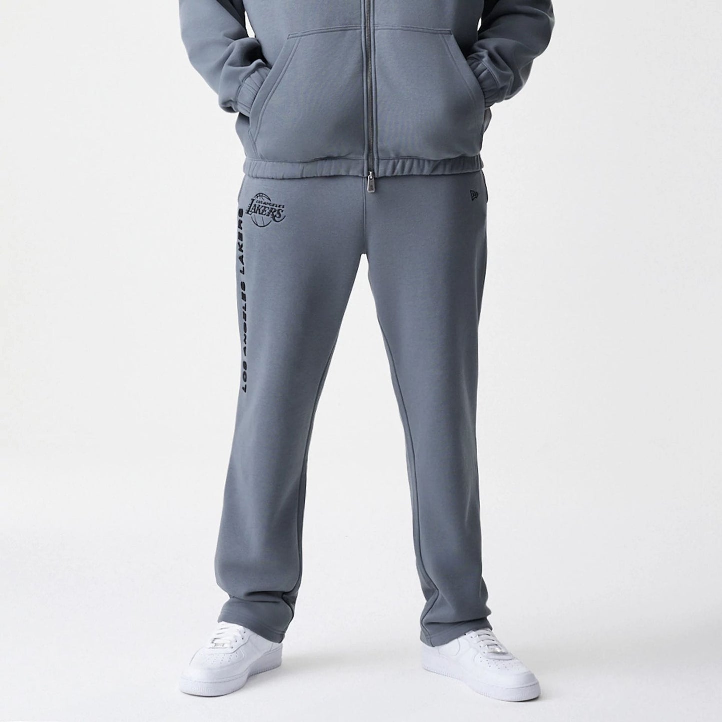 The Male model is wearing LA Lakers NBA Linear Dark Grey Straight Leg Joggers  5