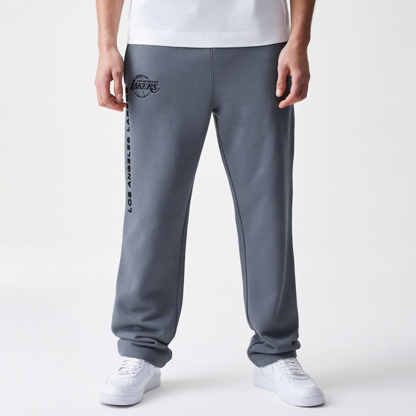 The Male model is wearing LA Lakers NBA Linear Dark Grey Straight Leg Joggers 1