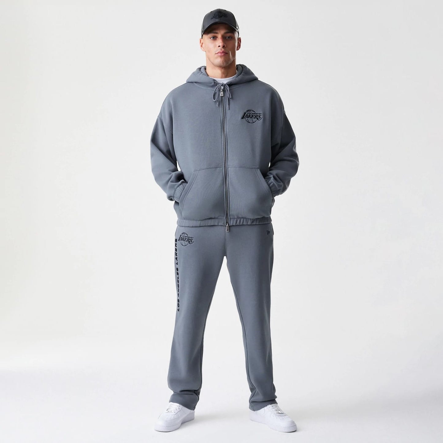 The Male model is wearing LA Lakers NBA Linear Dark Grey Straight Leg Joggers 8