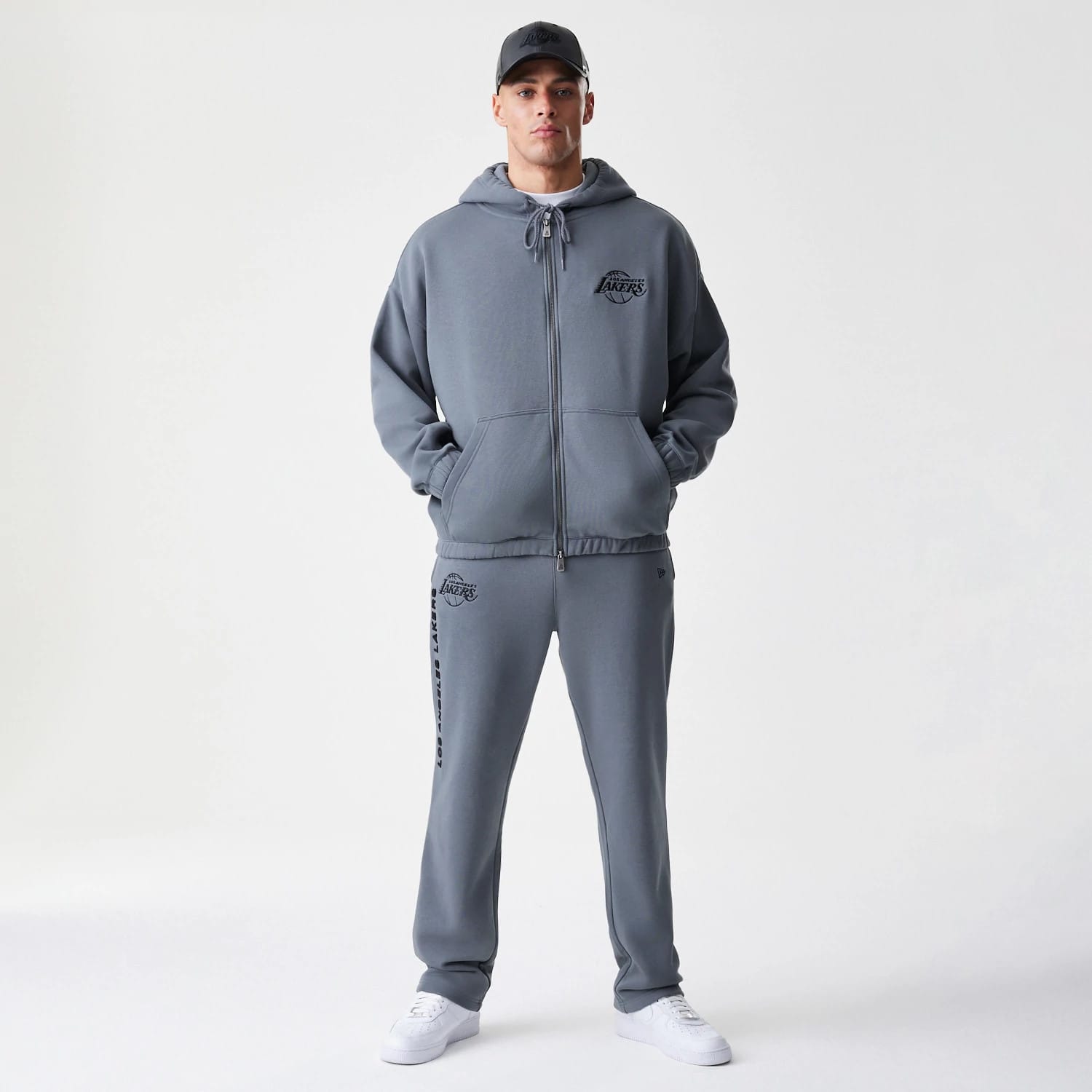 The Male model is wearing LA Lakers NBA Linear Dark Grey Straight Leg Joggers 8