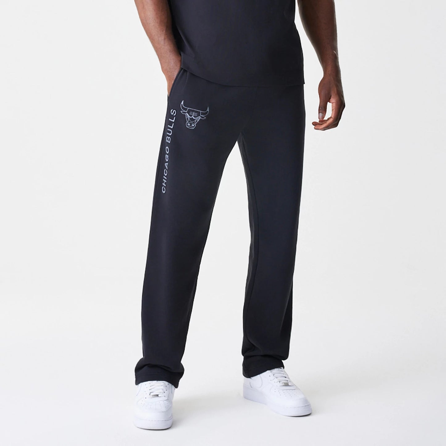 The Male model is wearing Chicago Bulls NBA Linear Black Straight Leg Joggers 3