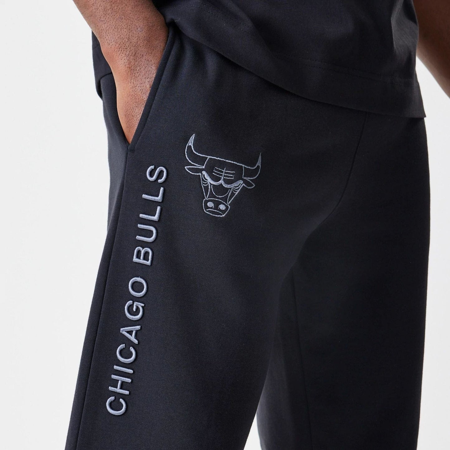The Male model is wearing Chicago Bulls NBA Linear Black Straight Leg Joggers  4
