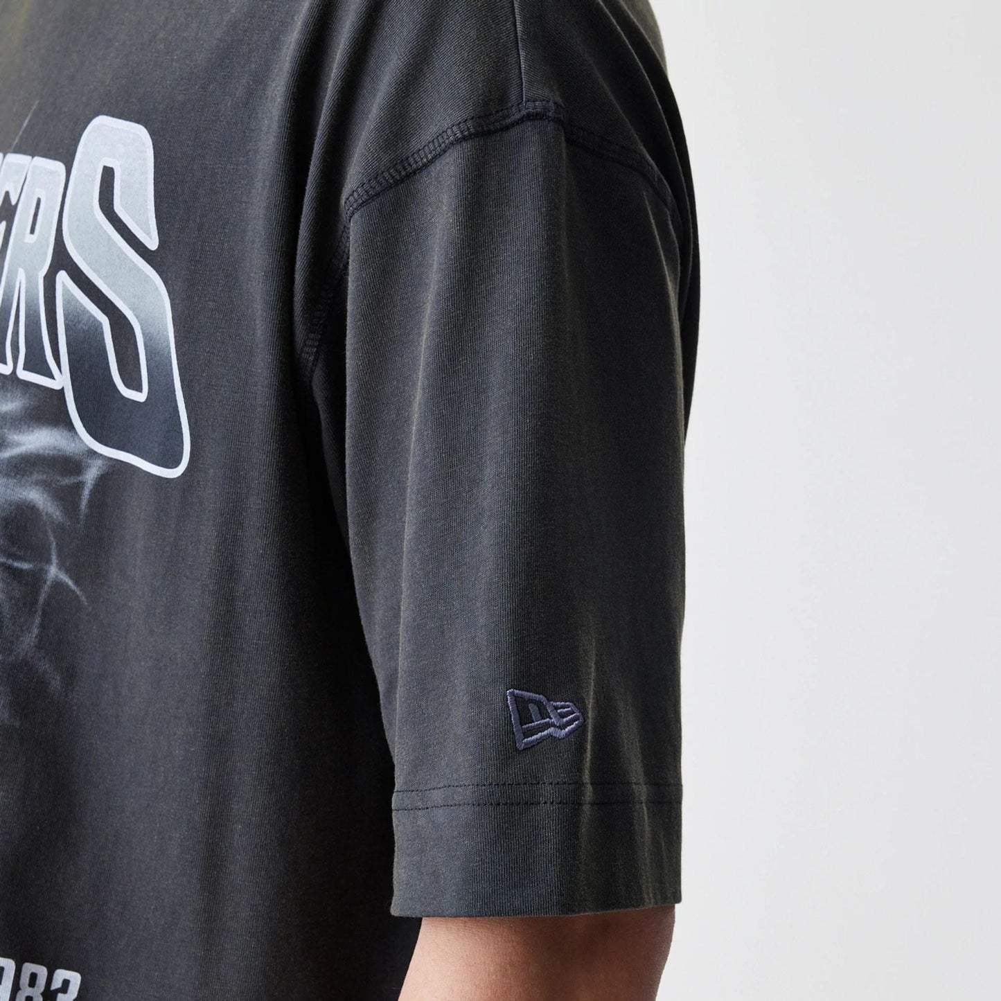 The Male model is wearing Las Vegas Raiders NFL Washed Boxy Dark Grey Oversized T-Shirt  5