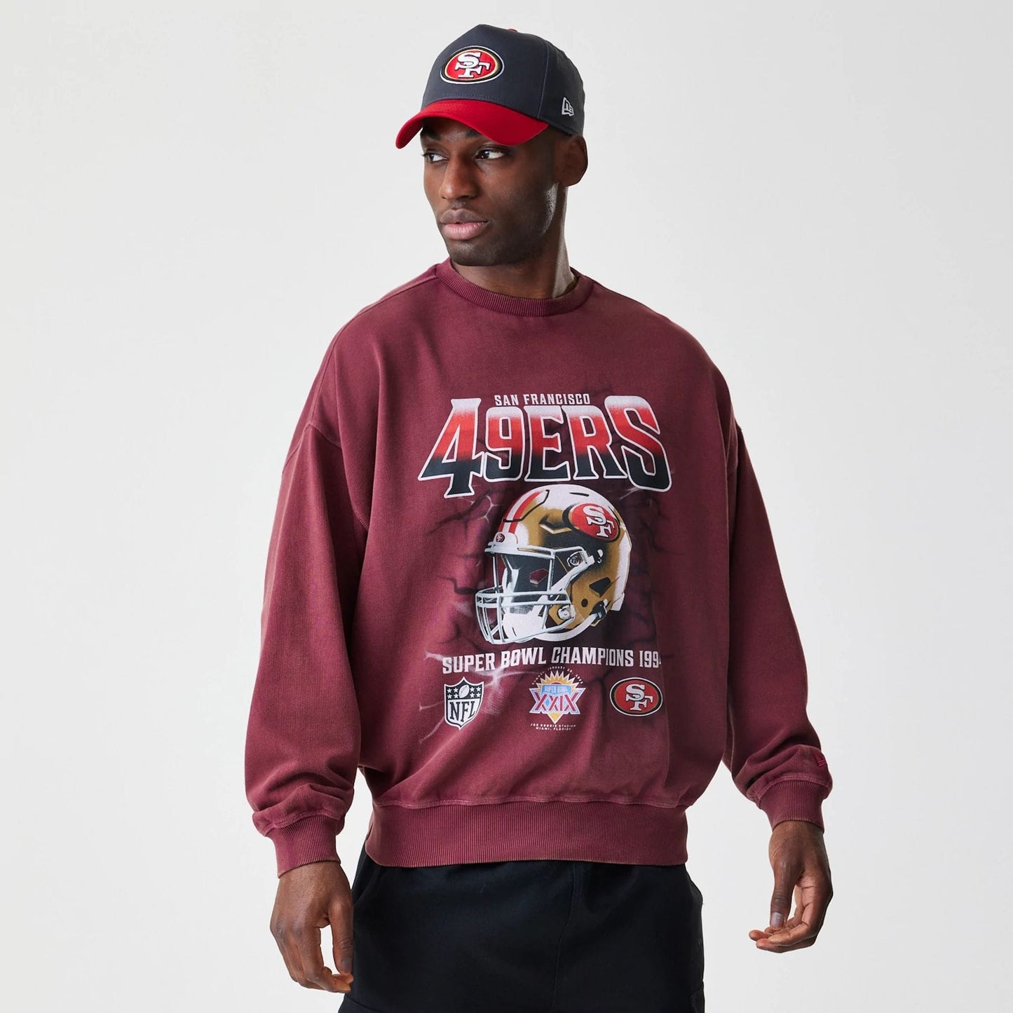 The Male model is wearing San Francisco 49ers NFL Washed Boxy Dark Red Oversized Crew Neck Sweater  1