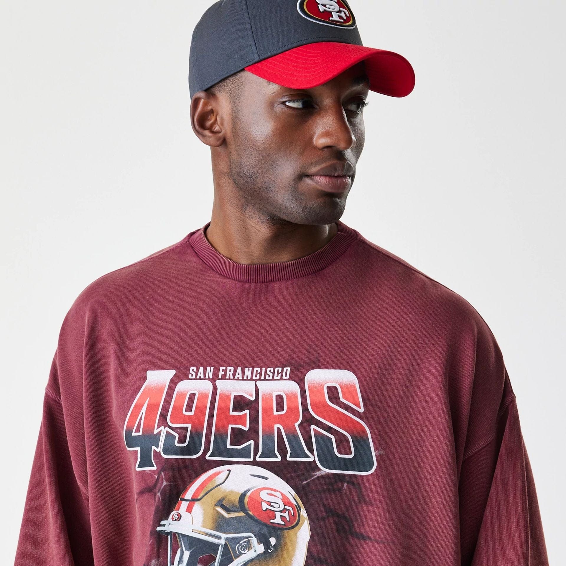The Male model is wearing San Francisco 49ers NFL Washed Boxy Dark Red Oversized Crew Neck Sweater  6