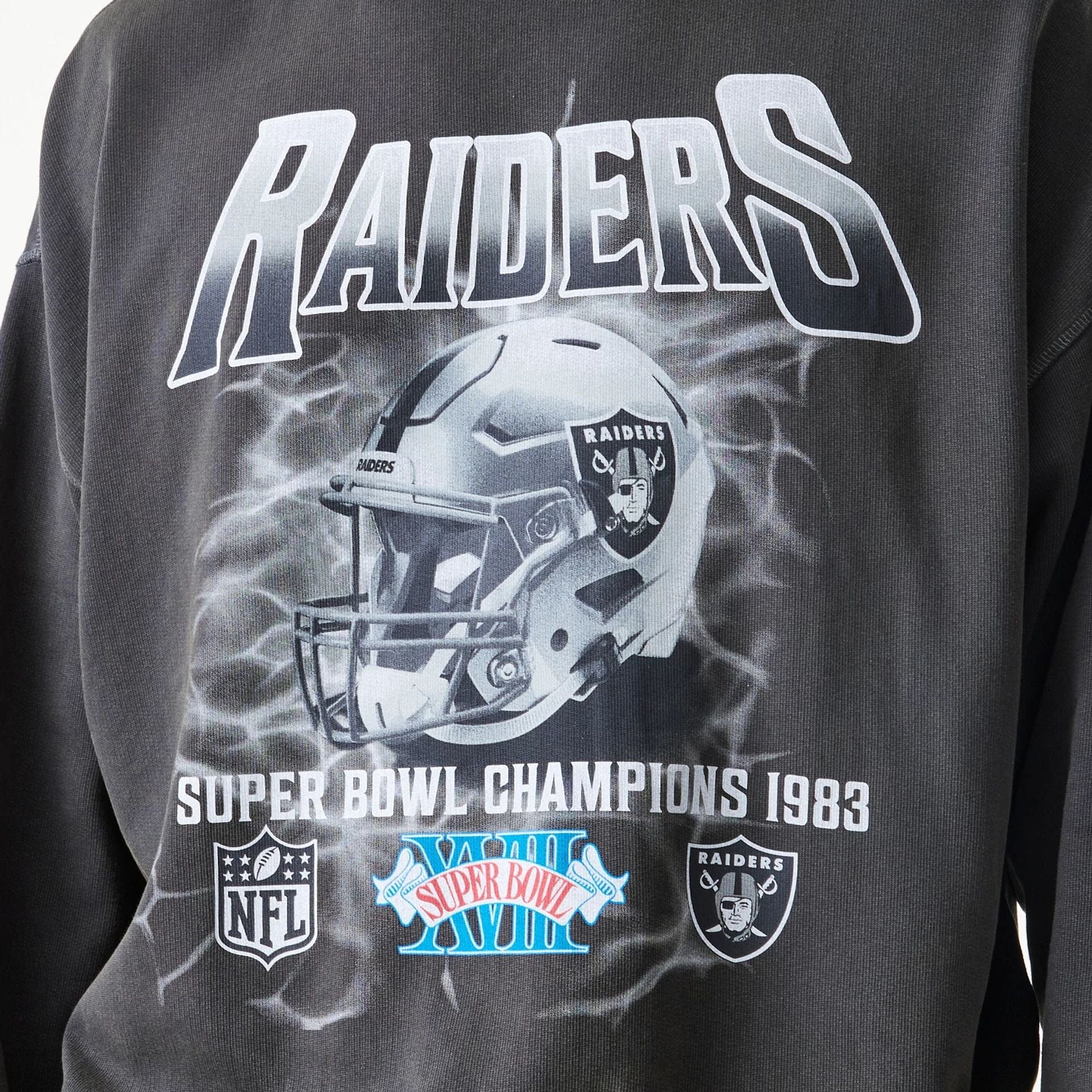 The Male model is wearing Las Vegas Raiders NFL Washed Boxy Dark Grey Oversized Crew Neck Sweater  5