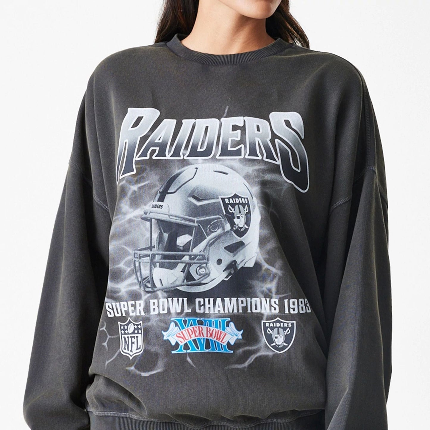 The Male model is wearing Las Vegas Raiders NFL Washed Boxy Dark Grey Oversized Crew Neck Sweater  6