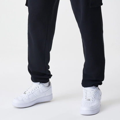 The Male model is wearing  New Era Cargo Black Joggers  5