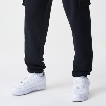 The Male model is wearing  New Era Cargo Black Joggers 5