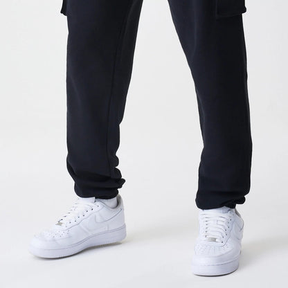 The Male model is wearing  New Era Cargo Black Joggers 5