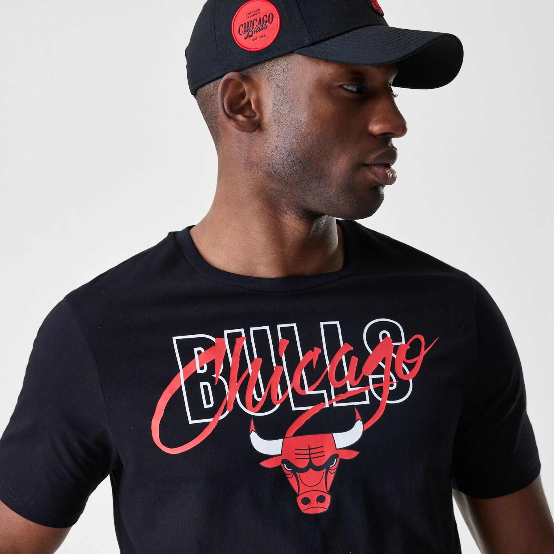 The Male model is wearing Chicago Bulls NBA Script Black T-Shirt  4