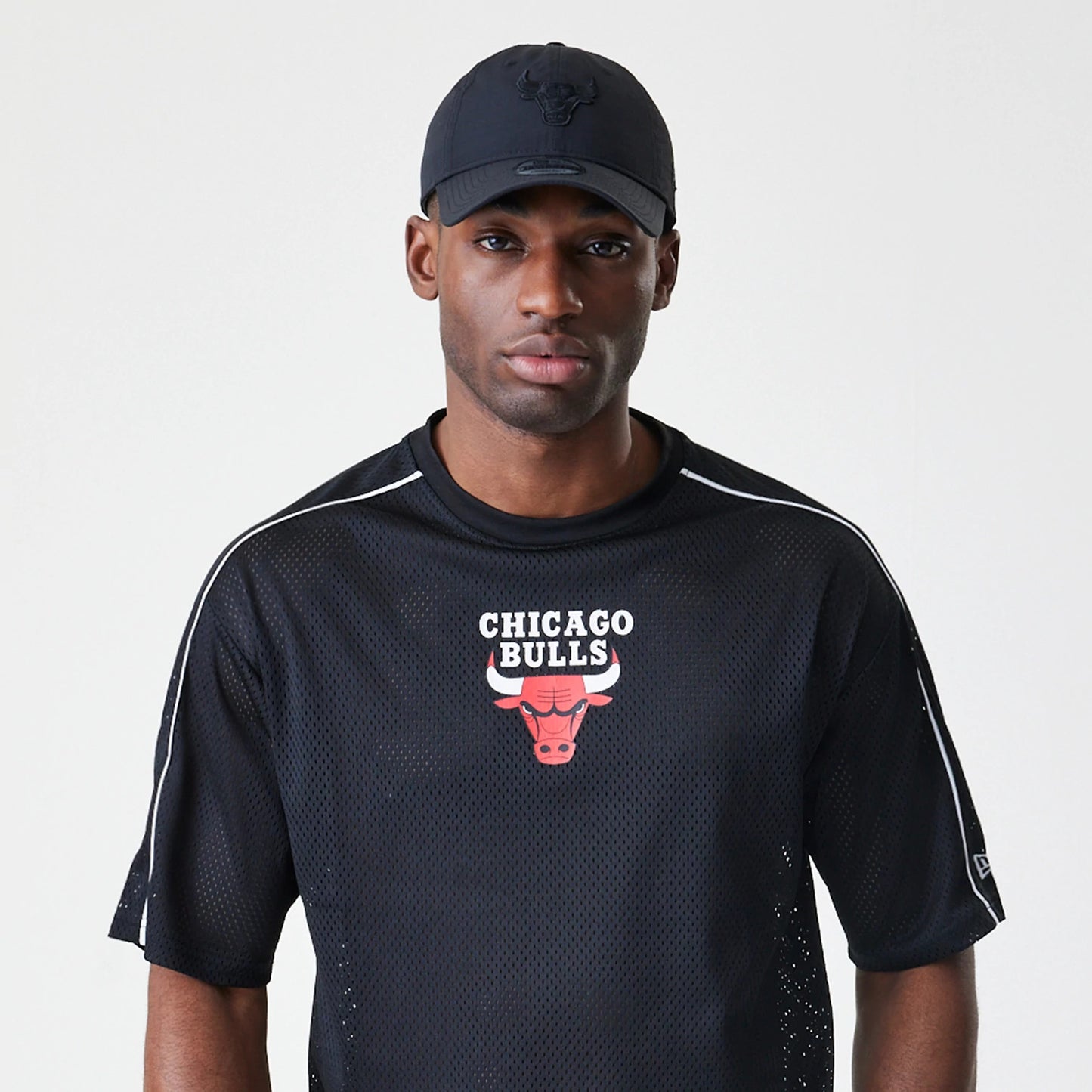 The Male model is wearing Chicago Bulls NBA Piping Black Oversized T-Shirt 6