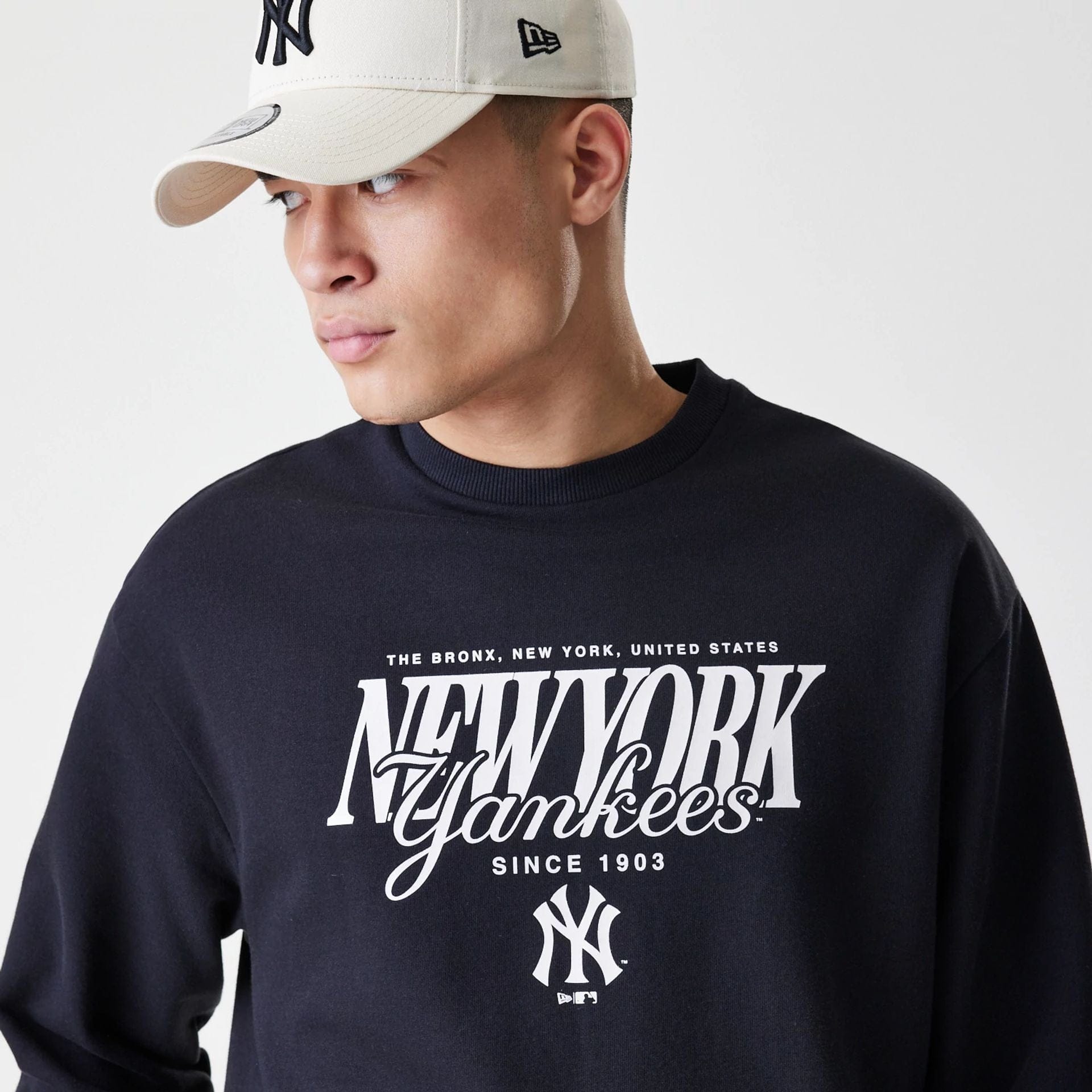 The Male model is wearing New York Yankees MLB Script Black Crew Neck Sweater  4
