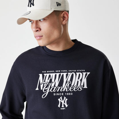 The Male model is wearing New York Yankees MLB Script Black Crew Neck Sweater 4