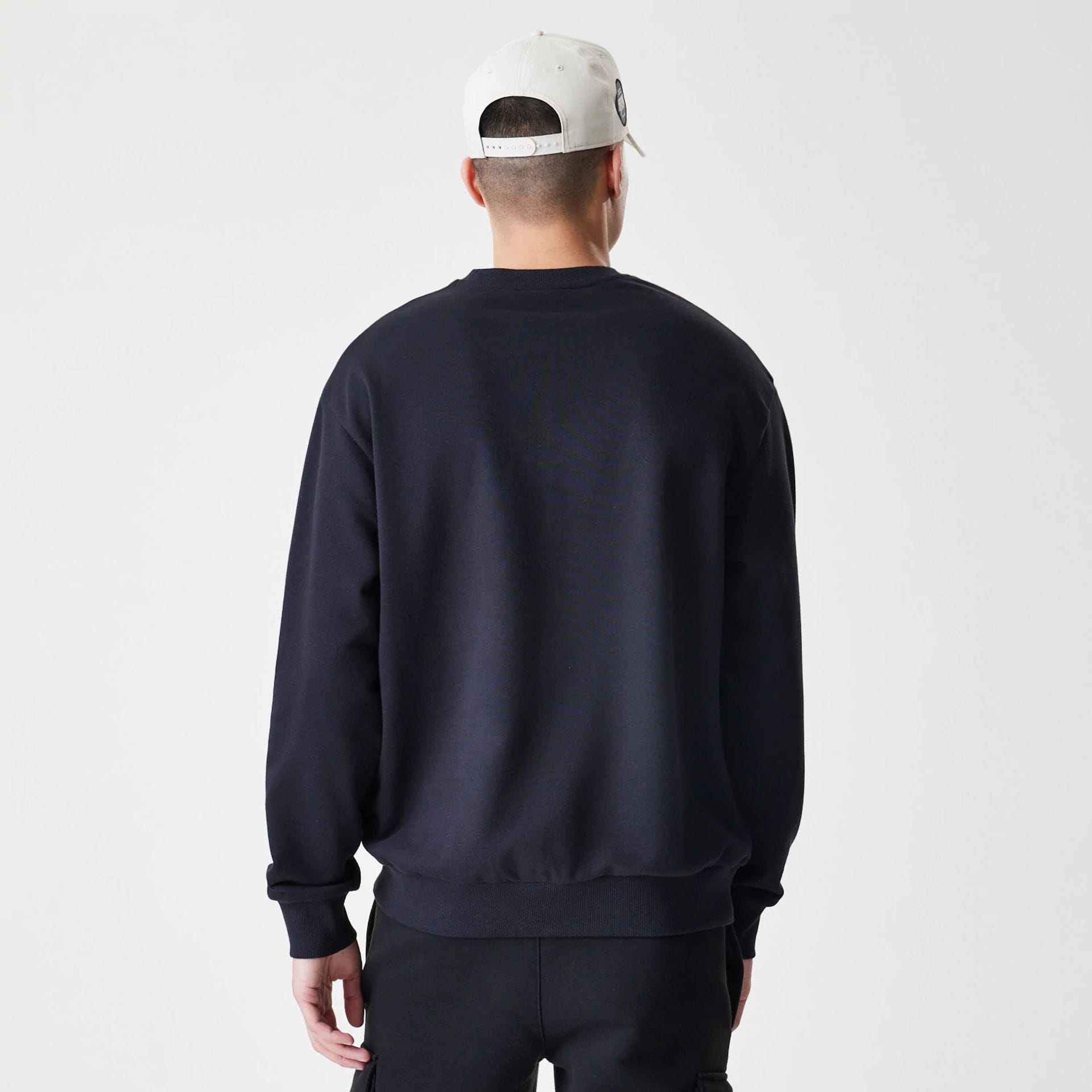 The Male model is wearing New York Yankees MLB Script Black Crew Neck Sweater 2