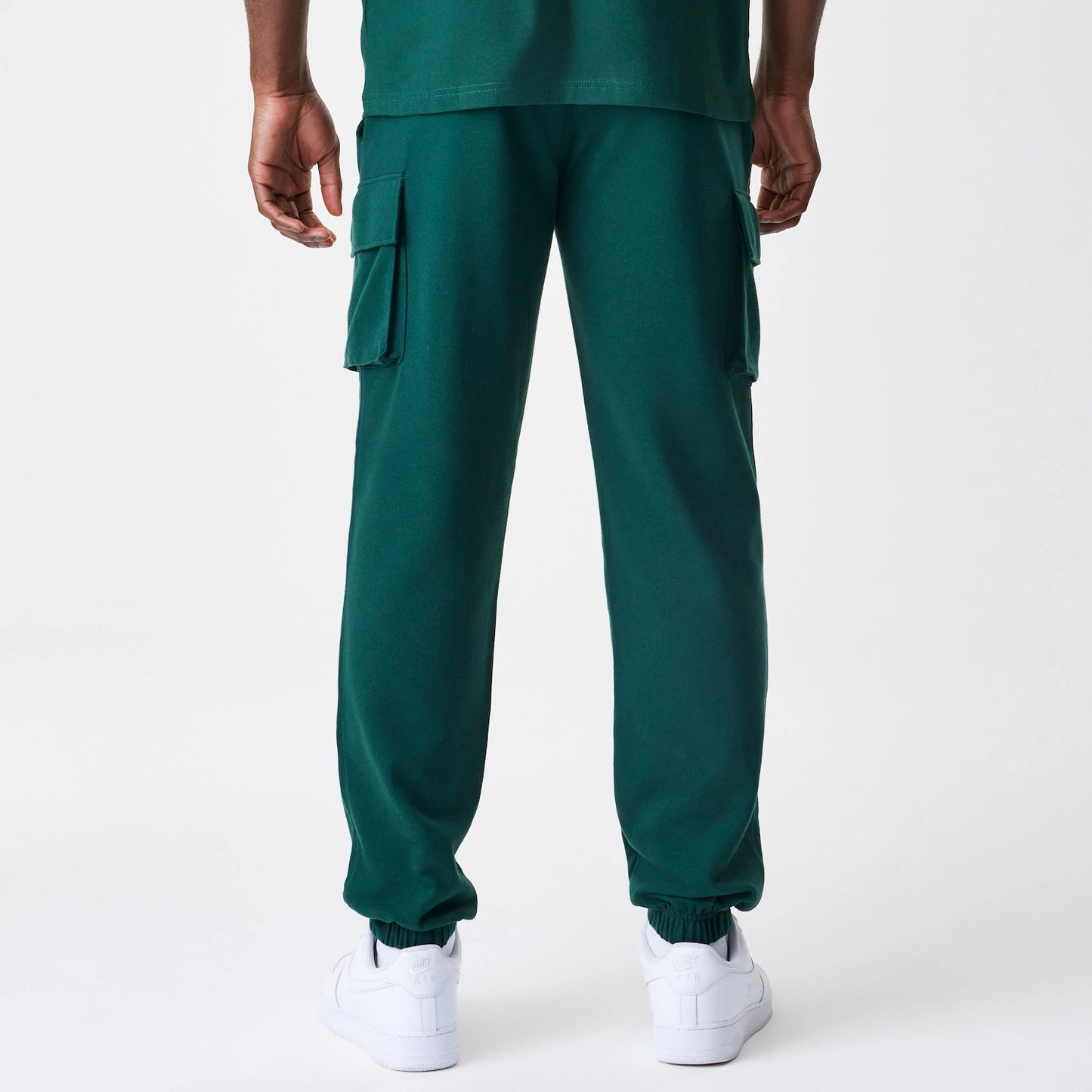 The Male model is wearing  New Era Core Cargo Dark Green Joggers 2