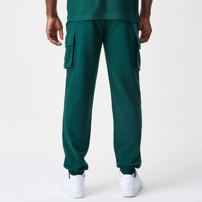 The Male model is wearing  New Era Core Cargo Dark Green Joggers 2