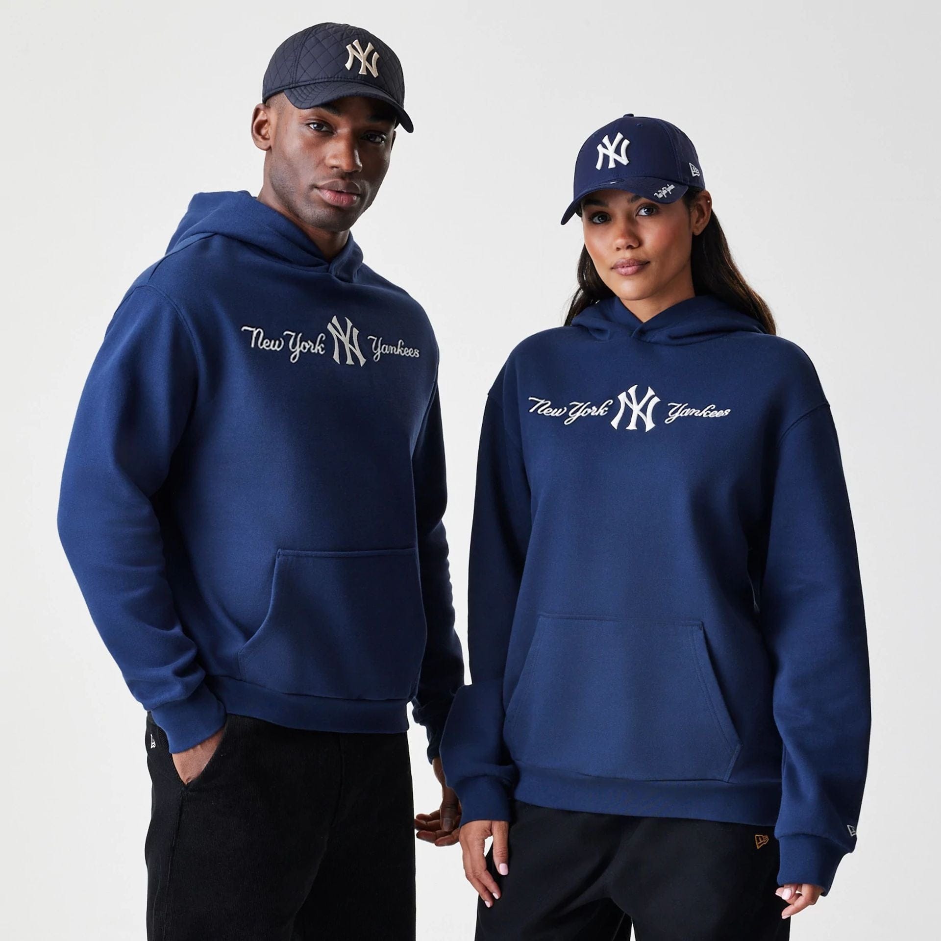 The Male model is wearing New York Yankees MLB Script Navy Oversized Pullover Hoodie  1