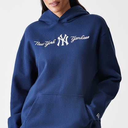 The Male model is wearing New York Yankees MLB Script Navy Oversized Pullover Hoodie 5