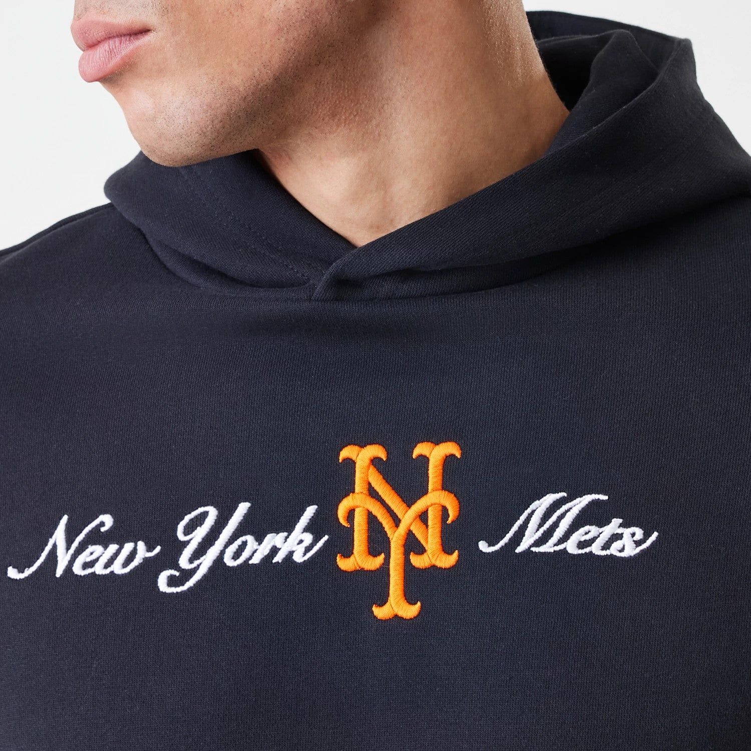 The Male model is wearing New York Mets MLB Script Black Oversized Pullover Hoodie 5