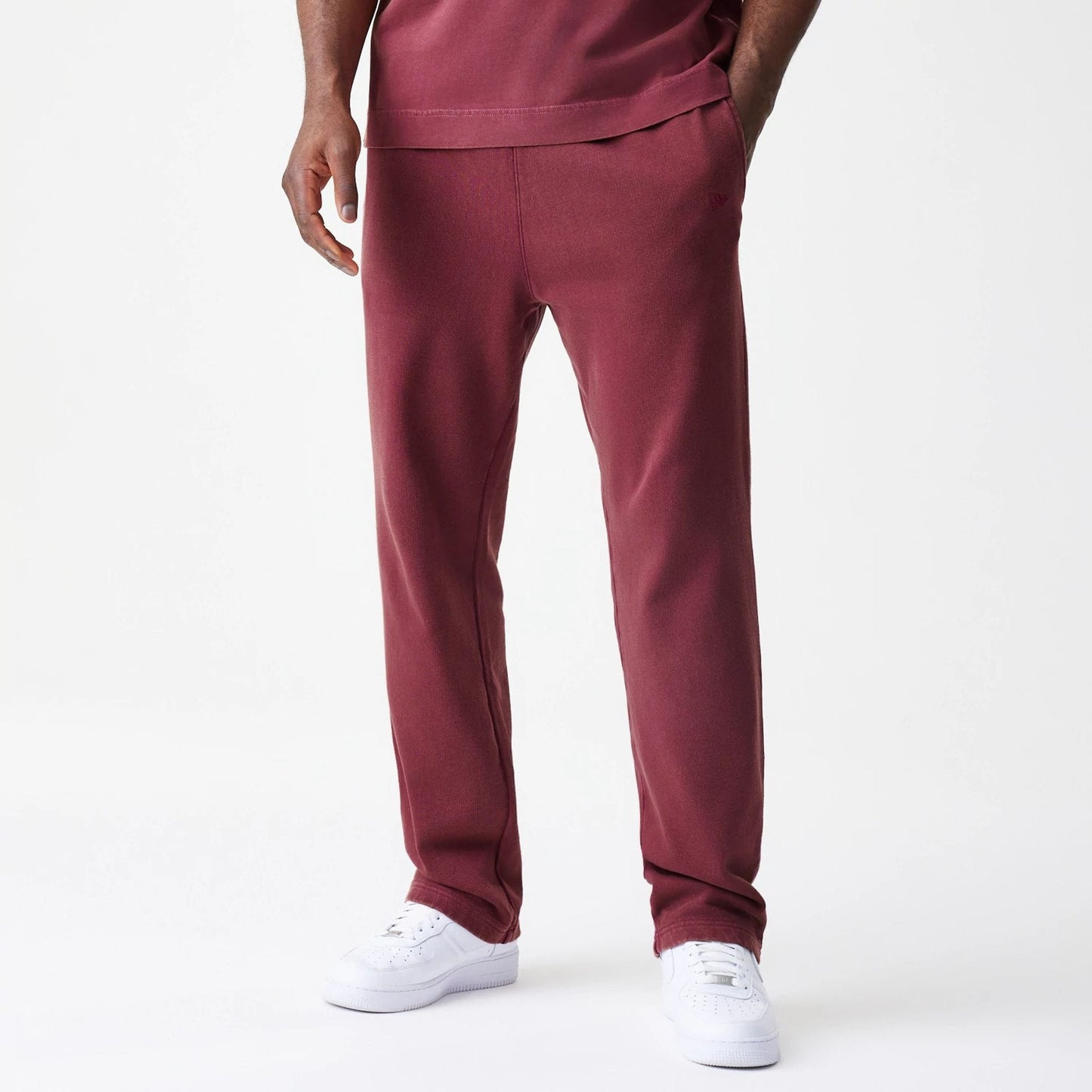 The Male model is wearing  New Era Washed Dark Red Straight Leg Joggers 1