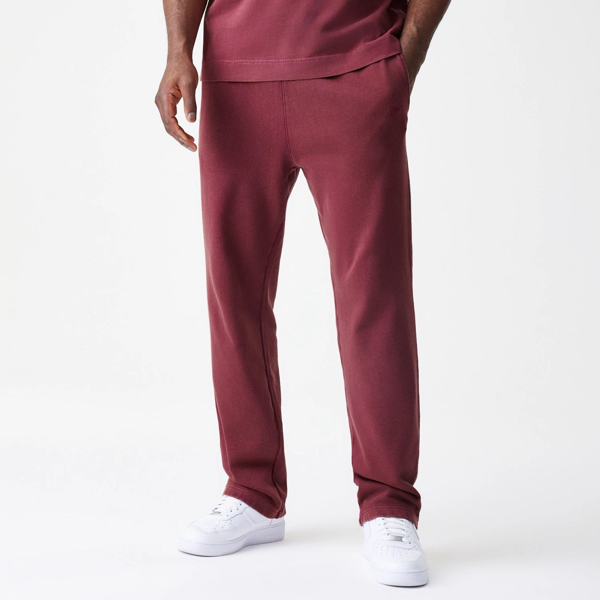 The Male model is wearing  New Era Washed Dark Red Straight Leg Joggers 1