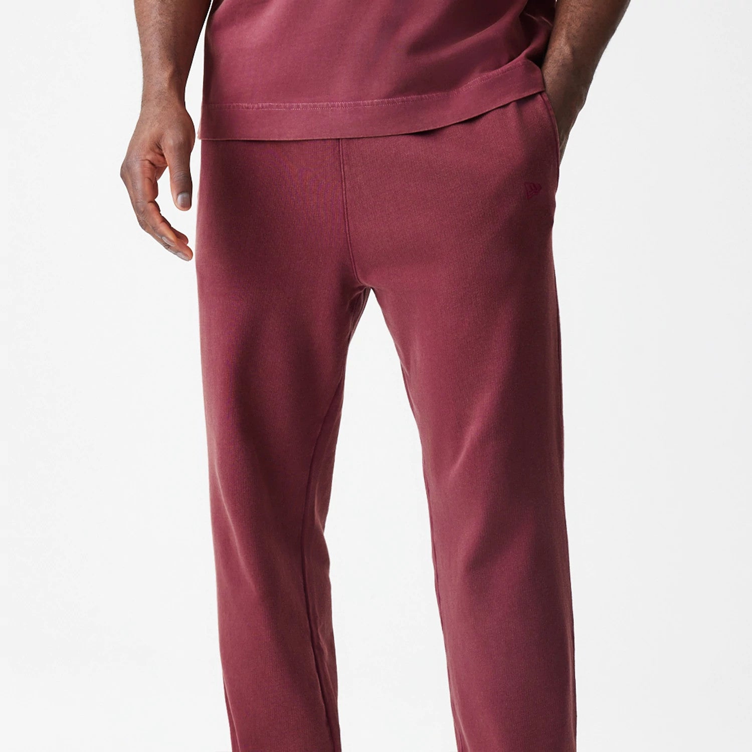 The Male model is wearing  New Era Washed Dark Red Straight Leg Joggers 4