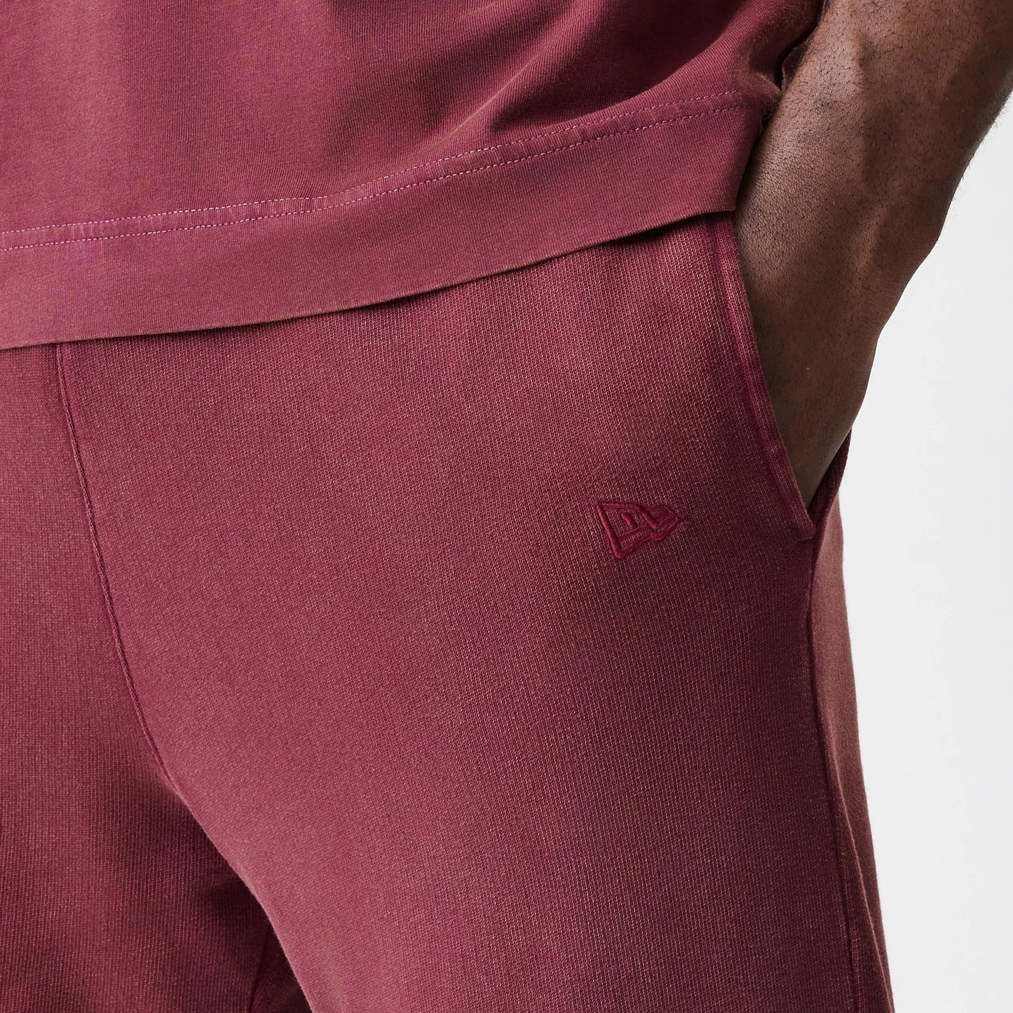 The Male model is wearing  New Era Washed Dark Red Straight Leg Joggers 5