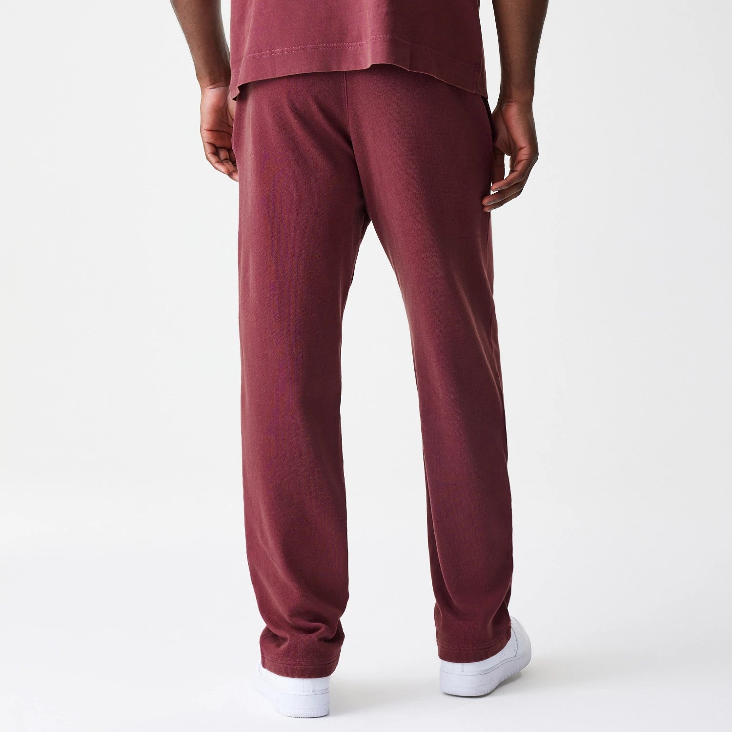 The Male model is wearing  New Era Washed Dark Red Straight Leg Joggers 2