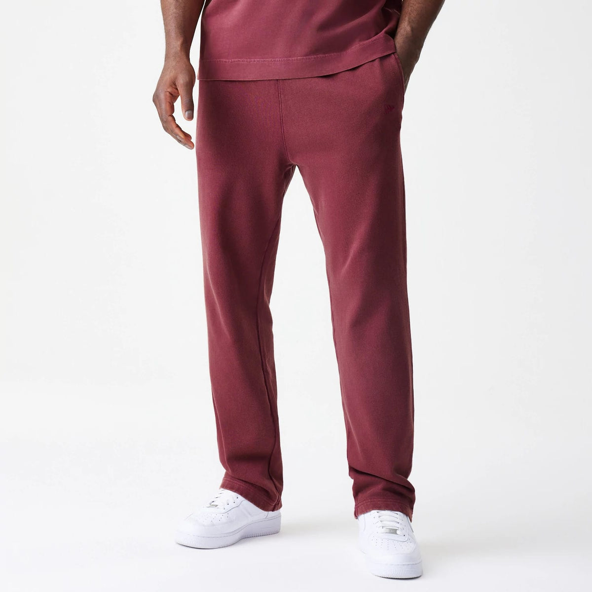 The Male model is wearing  New Era Washed Dark Red Straight Leg Joggers 1