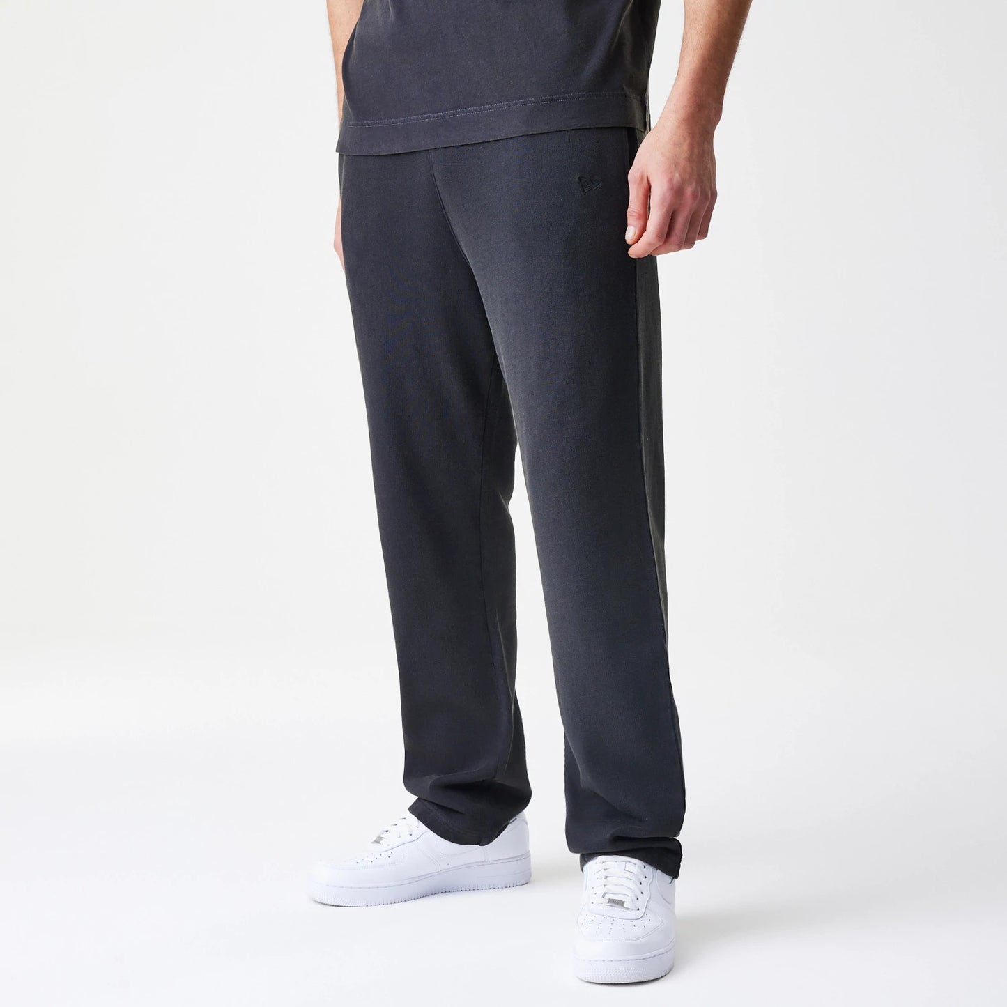 The Male model is wearing  New Era Washed Black Straight Leg Joggers 4