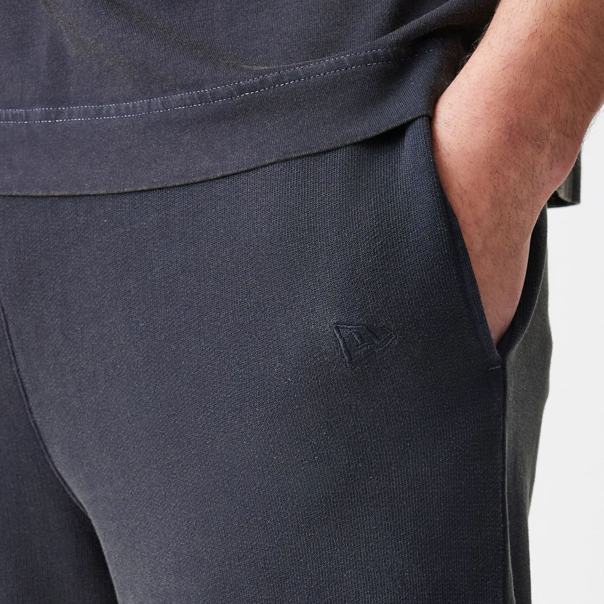 The Male model is wearing  New Era Washed Black Straight Leg Joggers  5