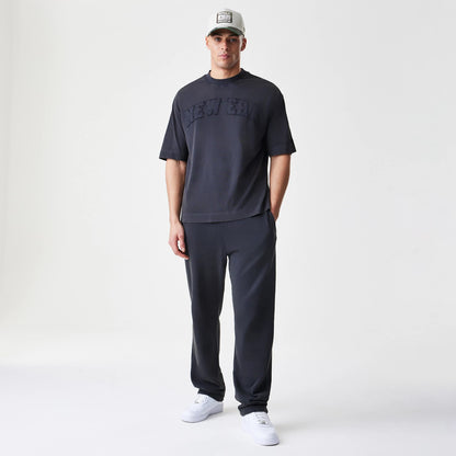 The Male model is wearing  New Era Washed Black Straight Leg Joggers 8