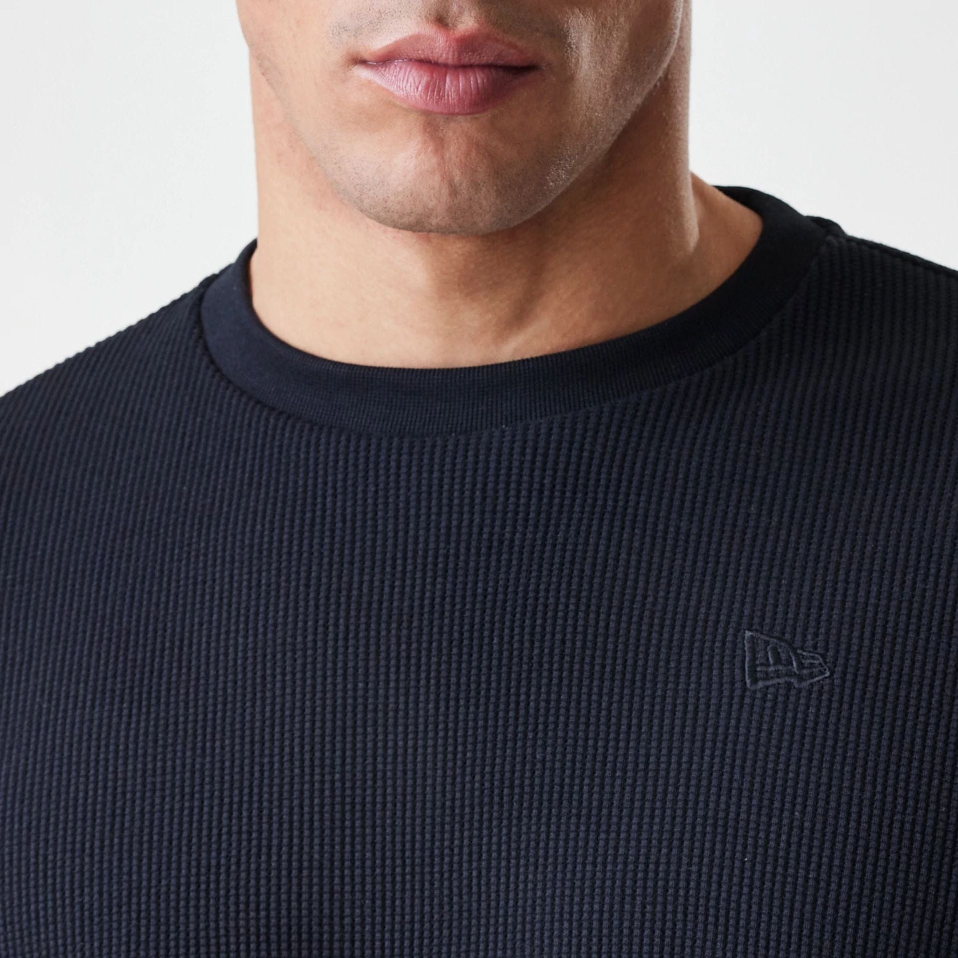 The Male model is wearing  New Era Waffle Black Long Sleeve T-Shirt  6