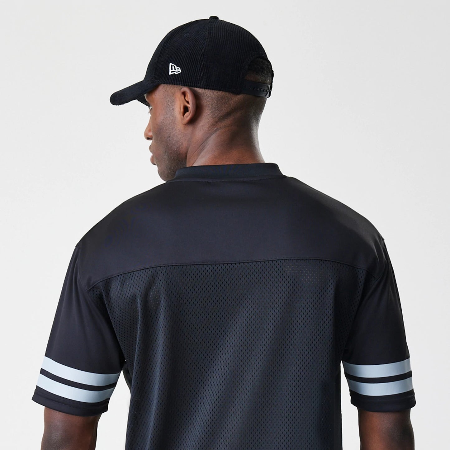 The Male model is wearing Las Vegas Raiders Script NFL Mesh Black Jersey 6