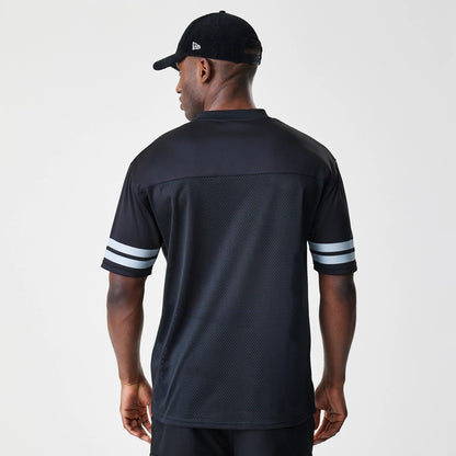 New Era Las Vegas Raiders NFL Script Mesh Black Jersey, back view on a model wearing a black cap, showing a mesh lower panel, solid shoulder yoke, and two white horizontal stripes on each sleeve.