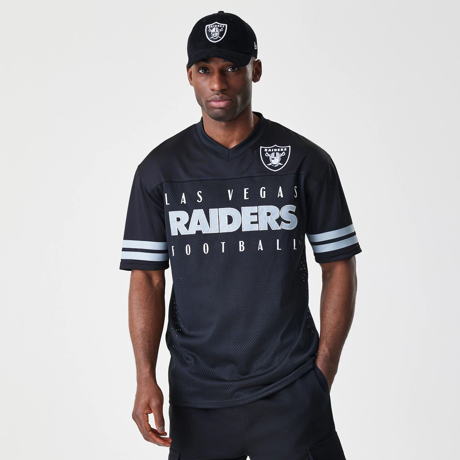 The Male model is wearing Las Vegas Raiders Script NFL Mesh Black Jersey 1